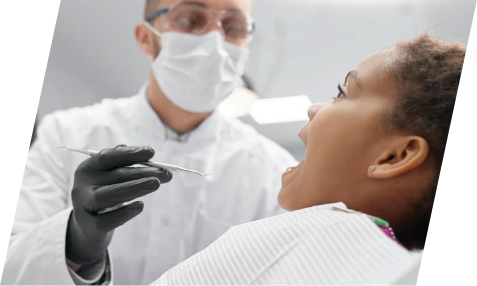 Angular collage featuring two brightly-colored mobile clinics in orange and green