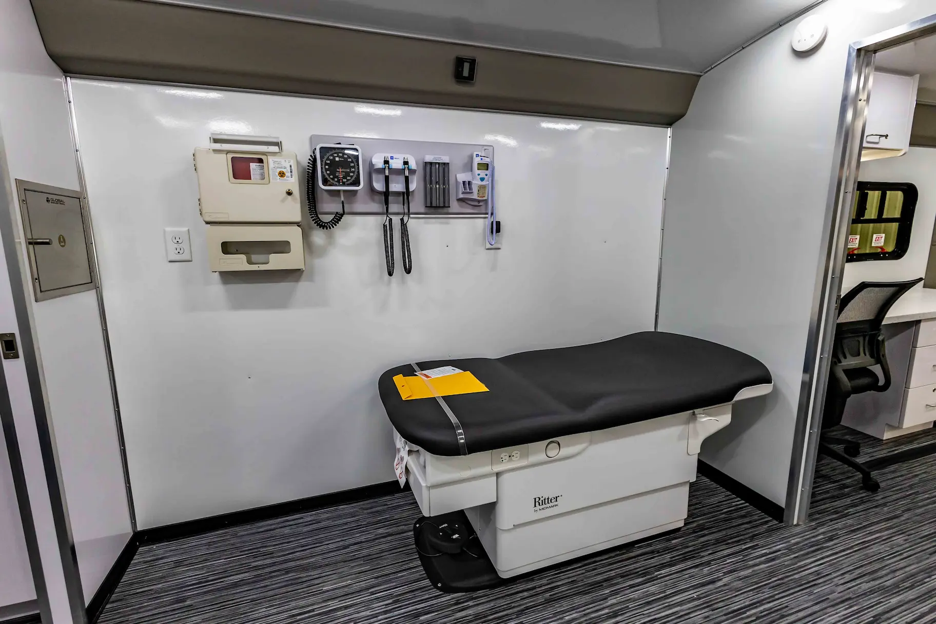 Interior of a used 2023 Two Exam Room Mobile Clinic w/ ADA Restroom and Office for sale