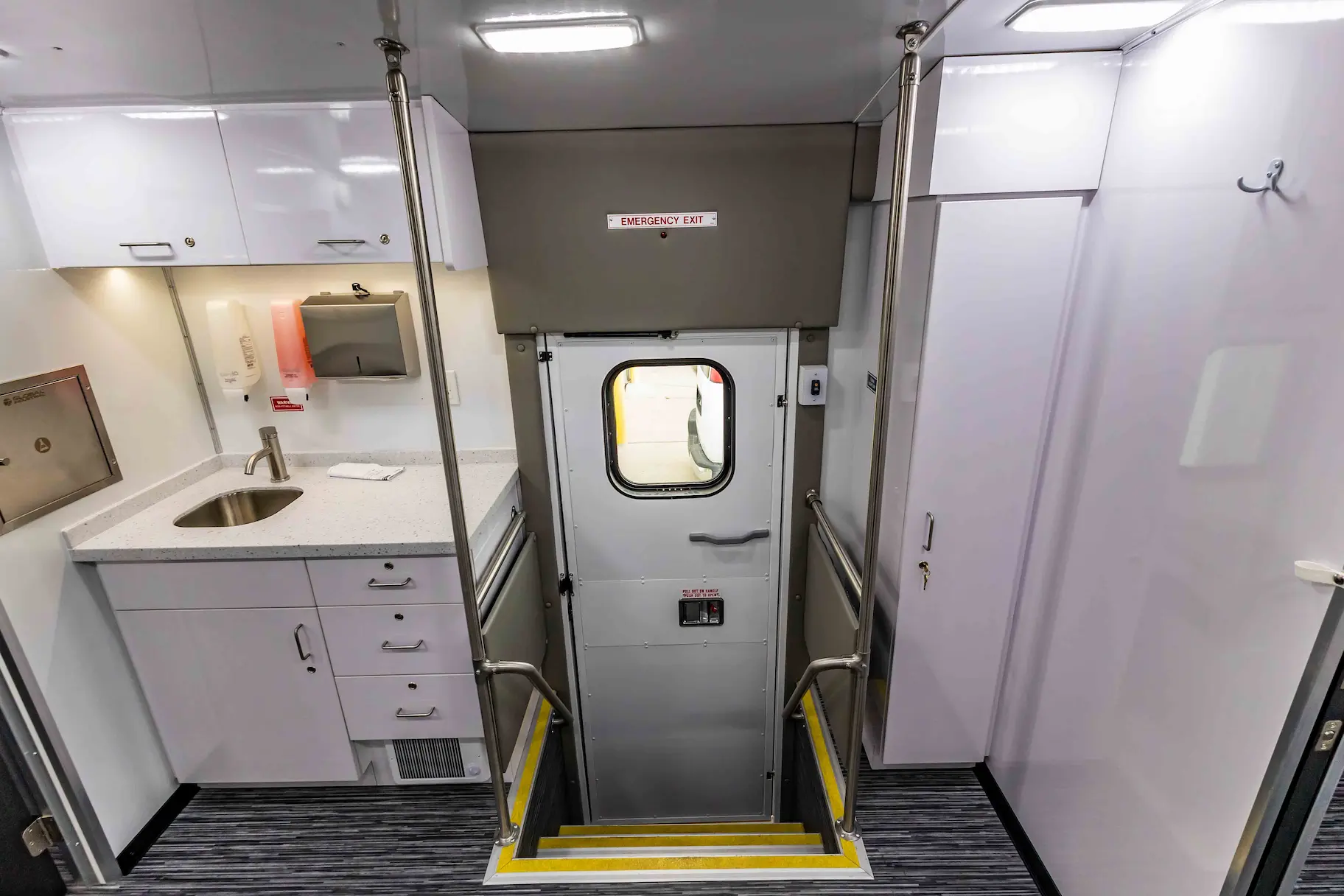 Interior of a used 2023 Two Exam Room Mobile Clinic w/ ADA Restroom and Office for sale