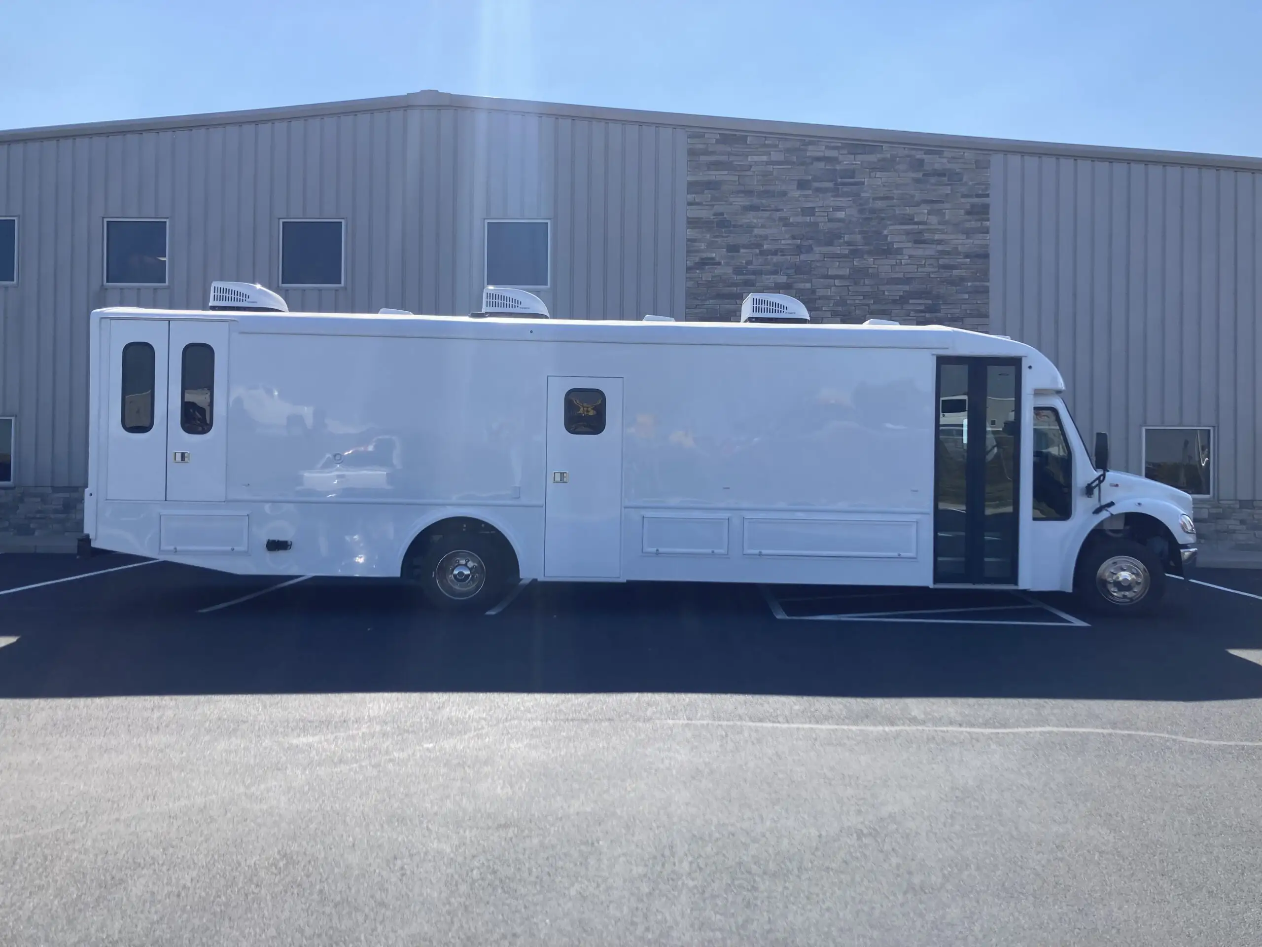 Exterior of a used 2023 Two Exam Room Mobile Clinic w/ ADA Restroom and Office for sale